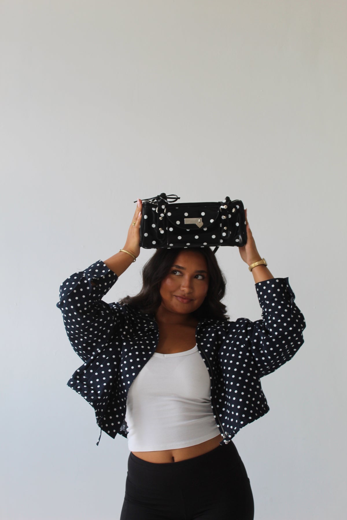 Black polka shoulder bag